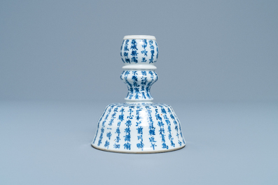 A Chinese blue and white Vietnamese market 'Bleu de Hue' candlestick, 19th C.