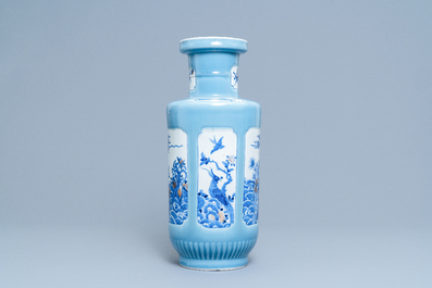 A Chinese blue, white and copper red lavender blue-ground rouleau vase, 19/20th C.