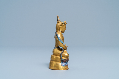 A Chinese gilt and parcel-flamb&eacute; glazed figure of a Bodhisattva, 19/20th C.