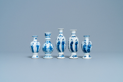 Four Chinese blue and white miniature vases and a huqqa base, Kangxi