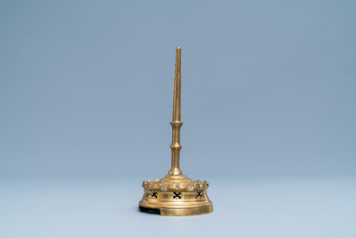 A Flemish or Dutch bronze candlestick, 14/15th C.