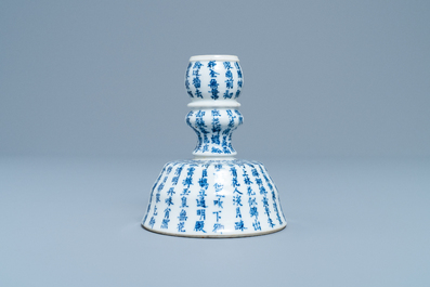 A Chinese blue and white Vietnamese market 'Bleu de Hue' candlestick, 19th C.