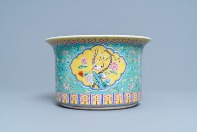 A Chinese turquoise-ground famille rose jardini&egrave;re, 19th C.