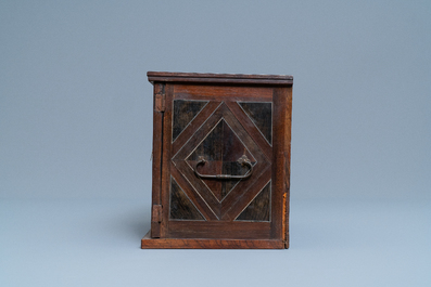A Dutch wood marquetry and bone inlay table cabinet, 17th C.