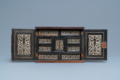 A Dutch wood marquetry and bone inlay table cabinet, 17th C.