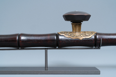 A Chinese tie li mu, paktong metal and Yixing stoneware opium pipe, 19th C.
