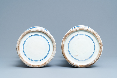 A pair of large Chinese blue and white 'Long Eliza' beaker vases, Kangxi