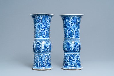 A pair of large Chinese blue and white 'Long Eliza' beaker vases, Kangxi