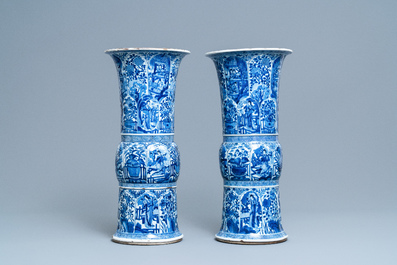 A pair of large Chinese blue and white 'Long Eliza' beaker vases, Kangxi