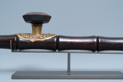 A Chinese tie li mu, paktong metal and Yixing stoneware opium pipe, 19th C.