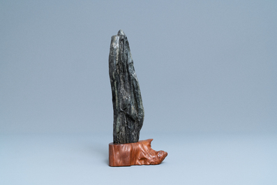 A Chinese scholar's dream stone on wooden stand, 19th C.