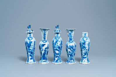 A Chinese blue and white five-piece garniture with boys and ladies, Kangxi