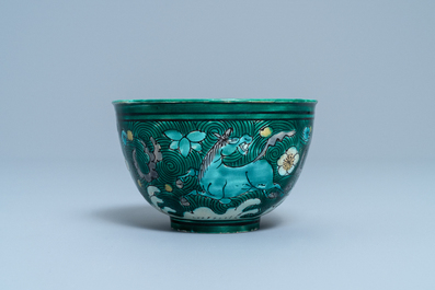 A Chinese verte biscuit bowl with horses, Kangxi