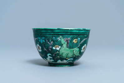 A Chinese verte biscuit bowl with horses, Kangxi