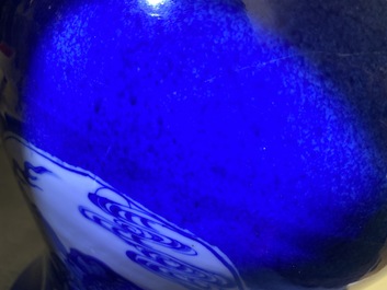 A Chinese blue and white powder blue-ground vase, Kangxi