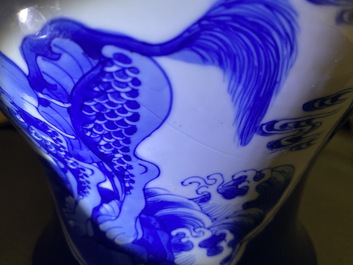 A Chinese blue and white powder blue-ground vase, Kangxi