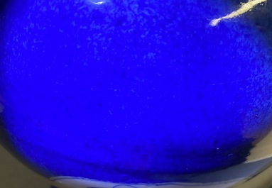 A Chinese blue and white powder blue-ground vase, Kangxi