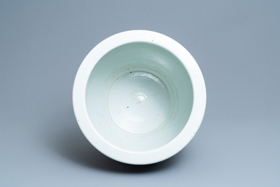A large Chinese famille verte relief-moulded fish bowl, 19th C.