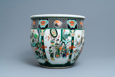 A large Chinese famille verte relief-moulded fish bowl, 19th C.