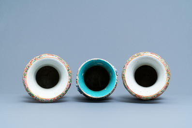 A pair of Chinese Canton famille rose vases and a single vase, 19th C.