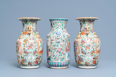 A pair of Chinese Canton famille rose vases and a single vase, 19th C.