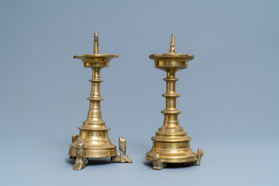 Two Flemish or Dutch bronze candlesticks, 15/16th C.