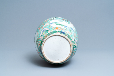 A large Chinese famille verte 'mythical beasts' jar with wooden cover, Kangxi