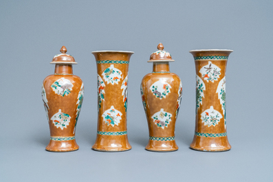 A Chinese famille verte capucin brown-ground four-piece garniture, 19th C.