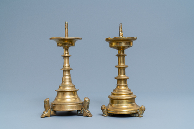 Two Flemish or Dutch bronze candlesticks, 15/16th C.