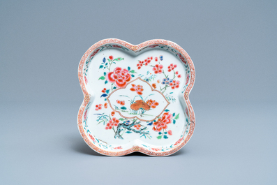 A Chinese famille rose teapot, tea caddy, milk jug and tray, Qianlong