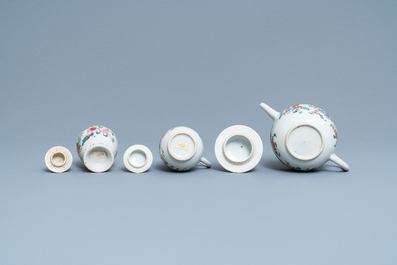 A Chinese famille rose teapot, tea caddy, milk jug and tray, Qianlong