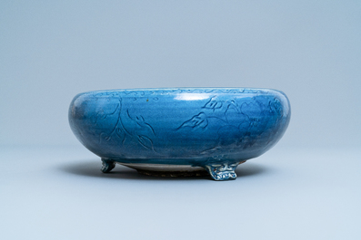 A Chinese monochrome blue censer with incised floral design, Ming