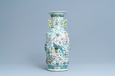 A Chinese relief-moulded famille rose 'antiquities' vase, 19th C.