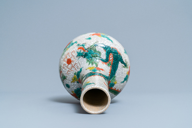 A Chinese famille verte 'dragon' bottle vase, 19/20th C.