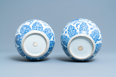 A pair of Chinese blue and white jars with floral design, Kangxi