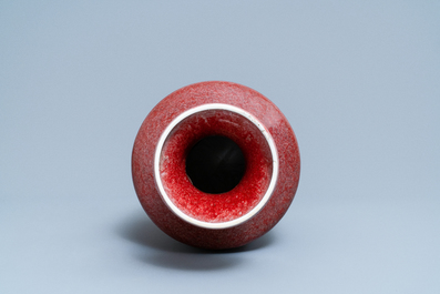 A Chinese monochrome copper red vase, 19th C.