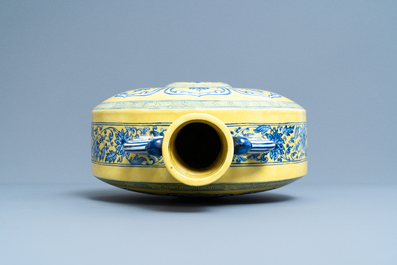A Chinese yellow-ground blue and white 'Bajixiang' moon flask vase, Yongzheng mark, 19/20th C.