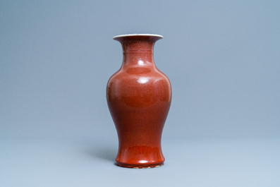A Chinese monochrome sang de boeuf vase, 19th C.