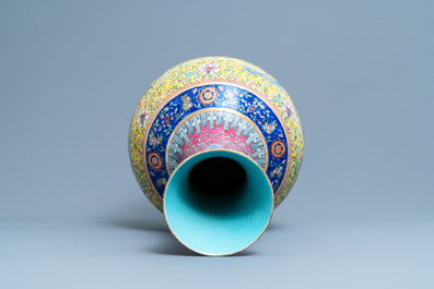 A large Chinese yellow-ground famille rose 'dragon and phoenix' bottle vase, 19th C.