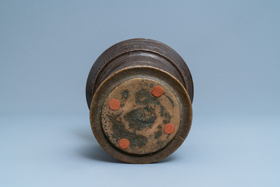 A large Flemish bronze mortar dated 1604 and inscribed Lille