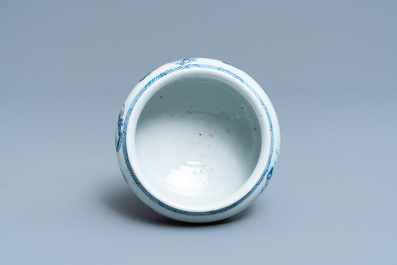 A Chinese blue and white stem cup with a continuous landscape scene, Kangxi/Yongzheng