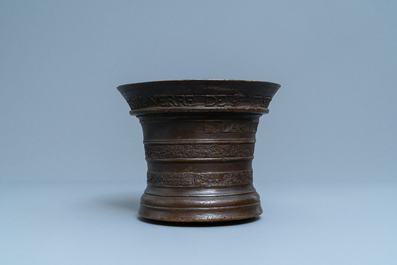 A large Flemish bronze mortar dated 1604 and inscribed Lille
