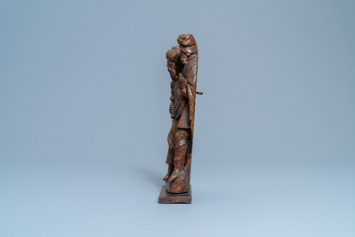 A Flemish carved oak group depicting two jews, probably Antwerp, 16th C.
