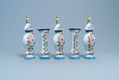 A polychrome Dutch Delft five-piece garniture with chicken-shaped finials, 18th C.