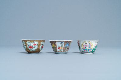 Three Chinese famille rose cups and saucers, Yongzheng/Qianlong