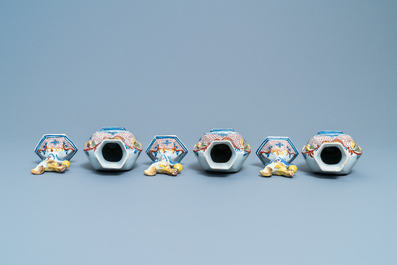 A polychrome Dutch Delft five-piece garniture with chicken-shaped finials, 18th C.