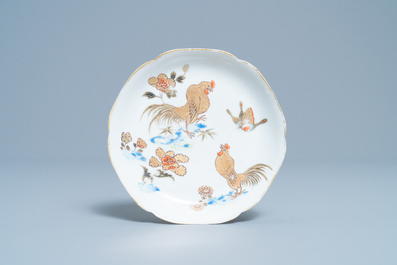 A Chinese gilt-decorated cup and saucer and a floral famille rose cup, Yongzheng
