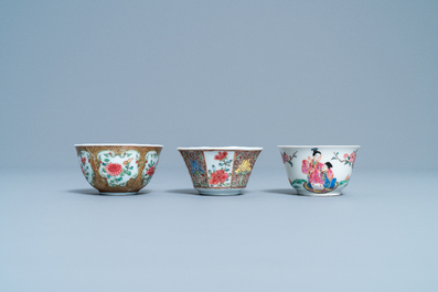 Three Chinese famille rose cups and saucers, Yongzheng/Qianlong