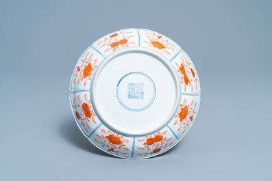 A Chinese blue, white and iron red 'Buddhist lion' dish, Qianlong mark, 19th C.