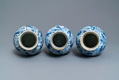 A large Chinese blue and white five-piece garniture with floral and landscape panels, Kangxi